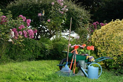 Team preparing equipment for lawn mowing at a Southgate property